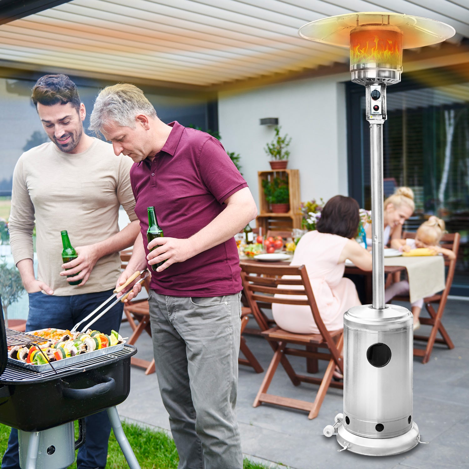 Two men cooking steaks standing infront of patio electric heater